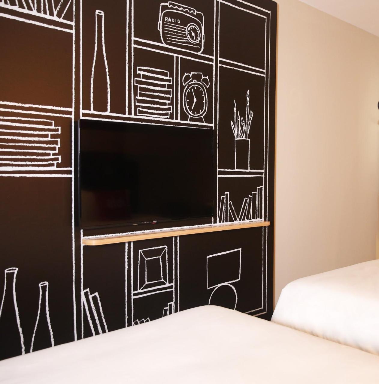 Ibis Haikou Injoy Plaza Hotel Bagian luar foto